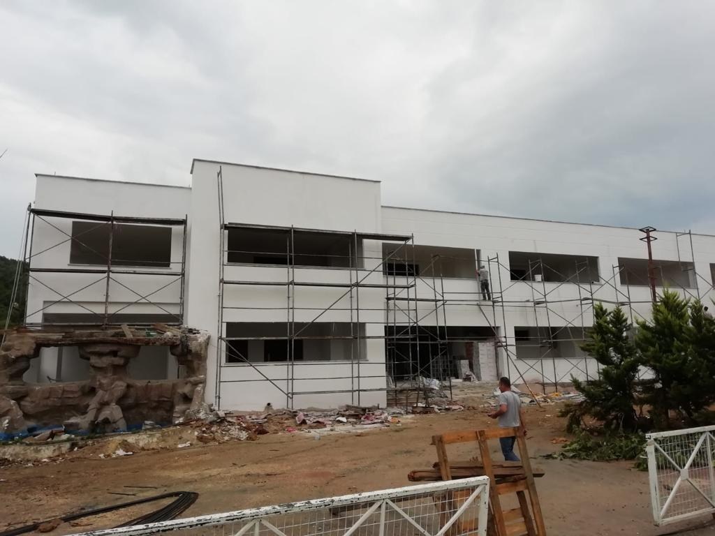 Exterior thermal coating works on an industrial building refurbishment